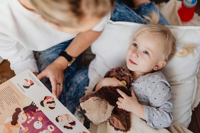 Reading a book a child